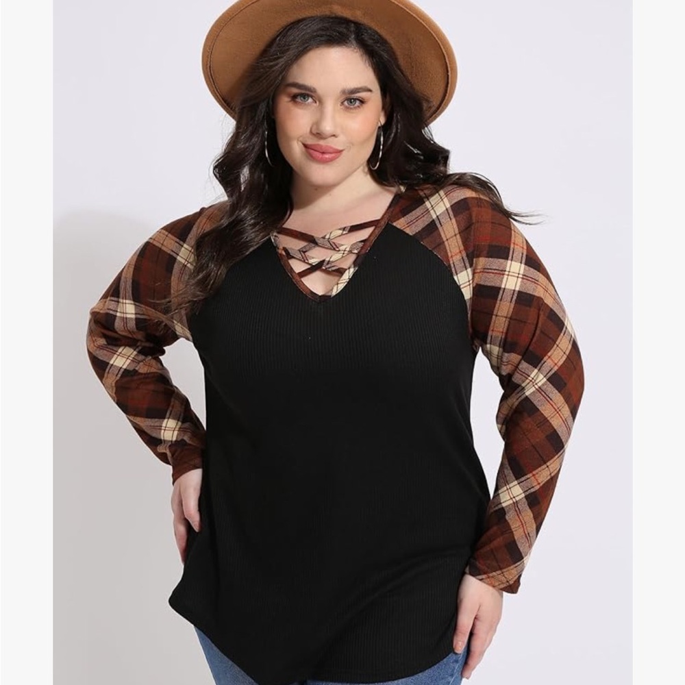 Chic Black Top with Plaid Sleeves